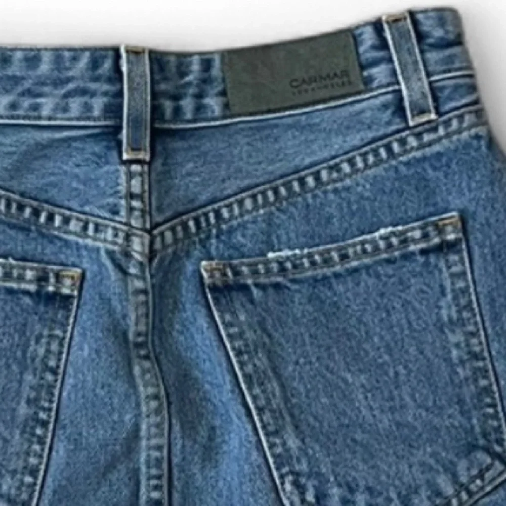 Carmar Los Angeles blue denim buckle cutout mini skirt, size 25. Distressed.